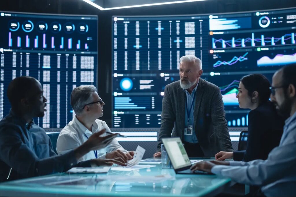 CEO collaborating with team on AI strategy to align company vision.